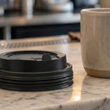 PakMax BLACK 90mm PS Plastic Coffee Cup Enclosure Lid - PSEL-90BK-LID